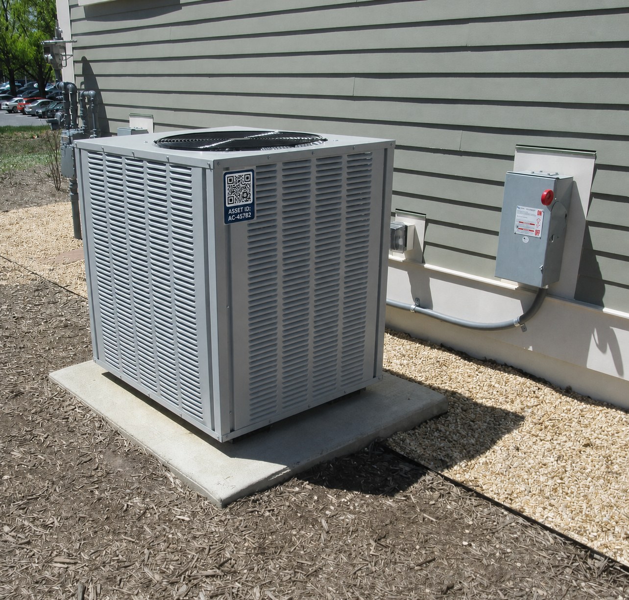 HVAC unit with an attached QR identification tag